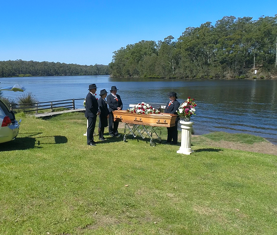 Narooma District funeral directors with a coffin