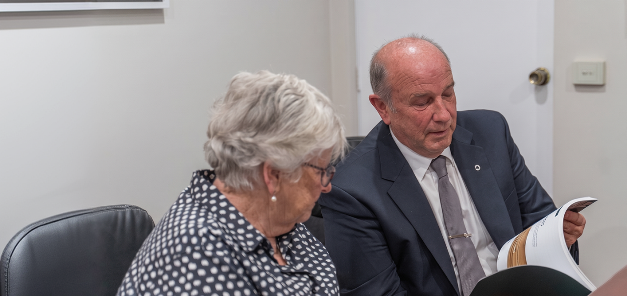 Narooma District funeral director helping a woman