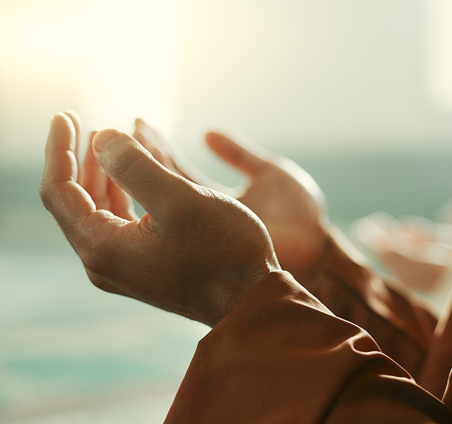 a person conducting a prayer