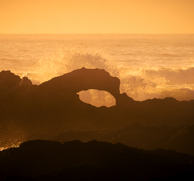 waves breaking on rocks